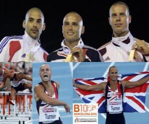 Rompicapo di Campione Andy Turner 110m ostacoli, Garfield Darien e Daniel Kiss (2 ° e 3 °) del Consiglio europeo di Barcellona Athletics Championships 2010