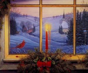 Rompicapo di Candela accesa di Natale di fronte a una finestra