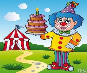 Rompicapo di Clown con una torta di anniversario