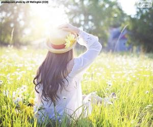 Rompicapo di Donna nel campo in primavera