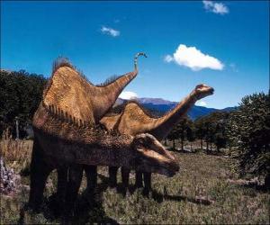 Rompicapo di Due dinosauri sul paesaggio