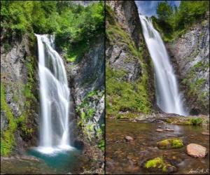 Rompicapo di la cascata del Saut Deth Pish, tra i 25 ei 30 metri di altezza la Val d'Aran, in Catalogna, Spagna.