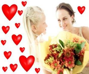 Rompicapo di La ragazza con un mazzo di fiori per sua madre e cuori rossi