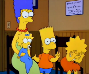 Rompicapo di Marge con i loro figli Bart, Lisa e Maggie nello studio del medico