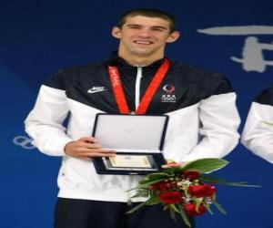 Rompicapo di Michael Phelps con un trofeo