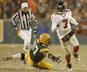 Rompicapo di Michael Vick corridore con il pallone in mano