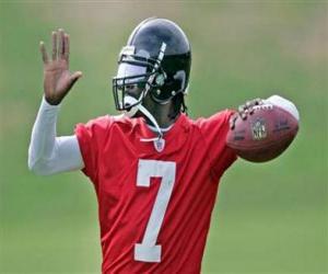 Rompicapo di Michael Vick in azione, pronto a cercare un passaggio