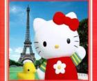 Hello Kitty con uccelli e la Torre Eiffel sfondo
