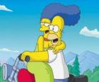 Homer e Marge Simpson in moto