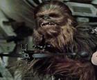 Chewbacca, il grande e peloso wookiee, ha sottolineato la sua pistola