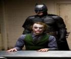 Batman interrogando e il suo nemico, il Joker