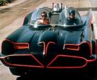 Batman e Robin nel suo Batmobile