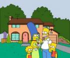 La famiglia Simpson di fronte a casa sua a Springfield