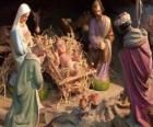 La Santa Famiglia nella stalla con il bue e il mulo, un pastore con una pecora e un re che i loro doni a Gesù