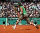 Partita di tennis con gli spettatori sulle tribune