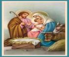 La Sacra Famiglia - San Giuseppe, la Madonna e il Bambino nella mangiatoia con il bue e il mulo