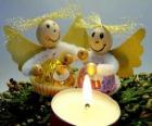 due angeli con una candela