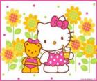 Hello Kitty con un drink in campagna con il suo orsacchiotto Tiny Chum