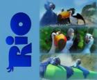 Logo dil film Rio con tre dei suoi protagonisti: le ara Blu, Jewel e Tucan Rafael