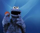 Il Cookie Monster è mangiare un biscotto