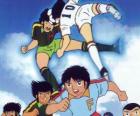 Giocatori di calcio in una partita da Captain Tsubasa