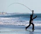 Pescatore sulla spiaggia