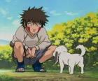 Kiba Inuzuka e il suo cane e migliore amico Akamaru fanno parte del Team 8