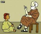 Professore o un insegnante, seduto su uno sgabello, per insegnare a un giovane ragazzo, seduto sul pavimento