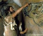 Un artista facendo un grotta preistorica dipinto raffigurante una bufala sulla parete di una grotta come un dinosauro come si è visto al di fuori