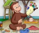 Il curioso scimmia George rende burattini