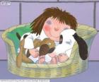 La piccola principessa a letto con il suo cane Collottola e il suo orsacchiotto