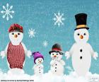 Famiglia bambole di neve
