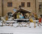 Mangiatoia coperta di neve