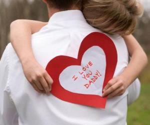 Rompicapo di Regazza congratulandosi con suo padre con un abbraccio e un cuore di carta