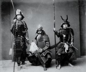 Rompicapo di Tre guerrieri samurai autentica, con l'armatura, il kabuto casco e armati